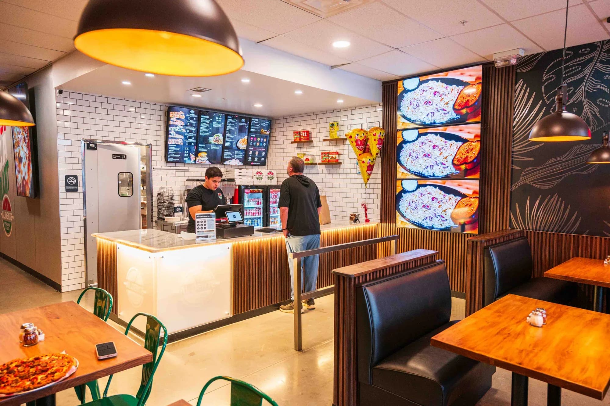 The counter at the Hoschton dining room, with the menu boards above it